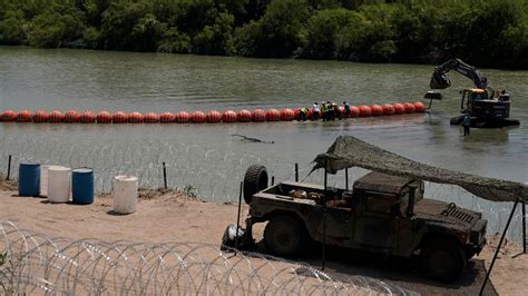 Texas to deploy buoys as new barriers at border, Abbott says